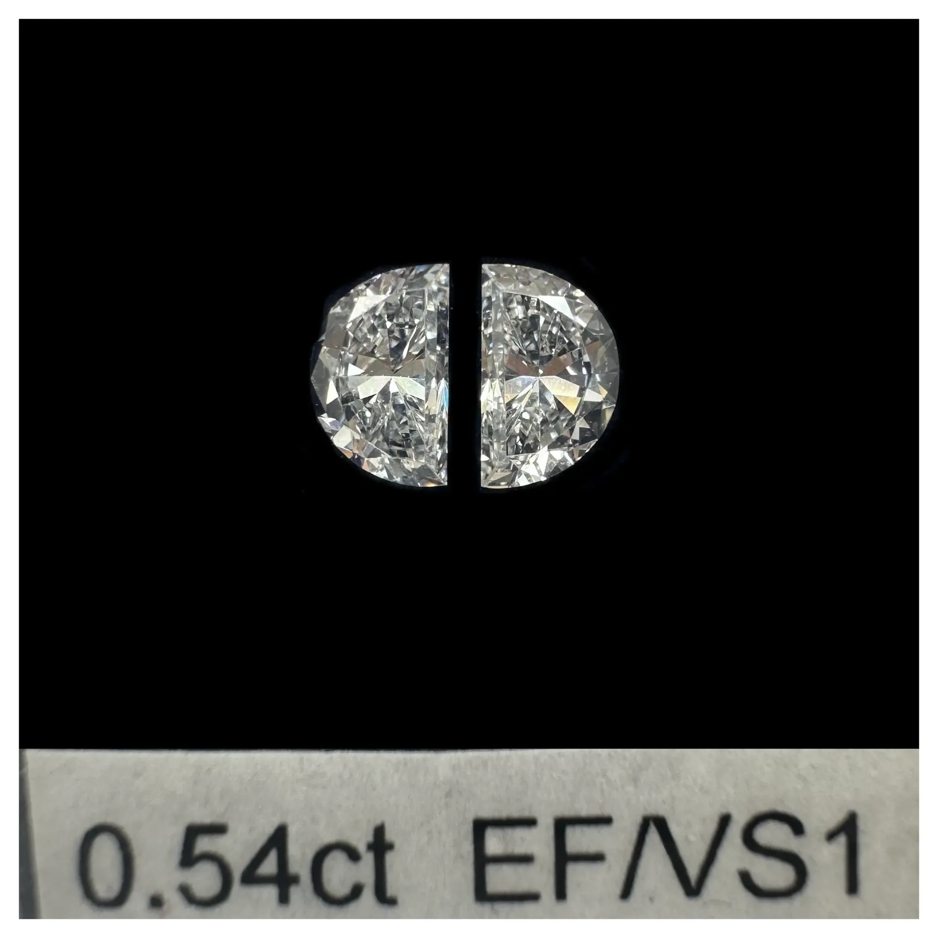 0.54ct matched pair step halfmoon LAB