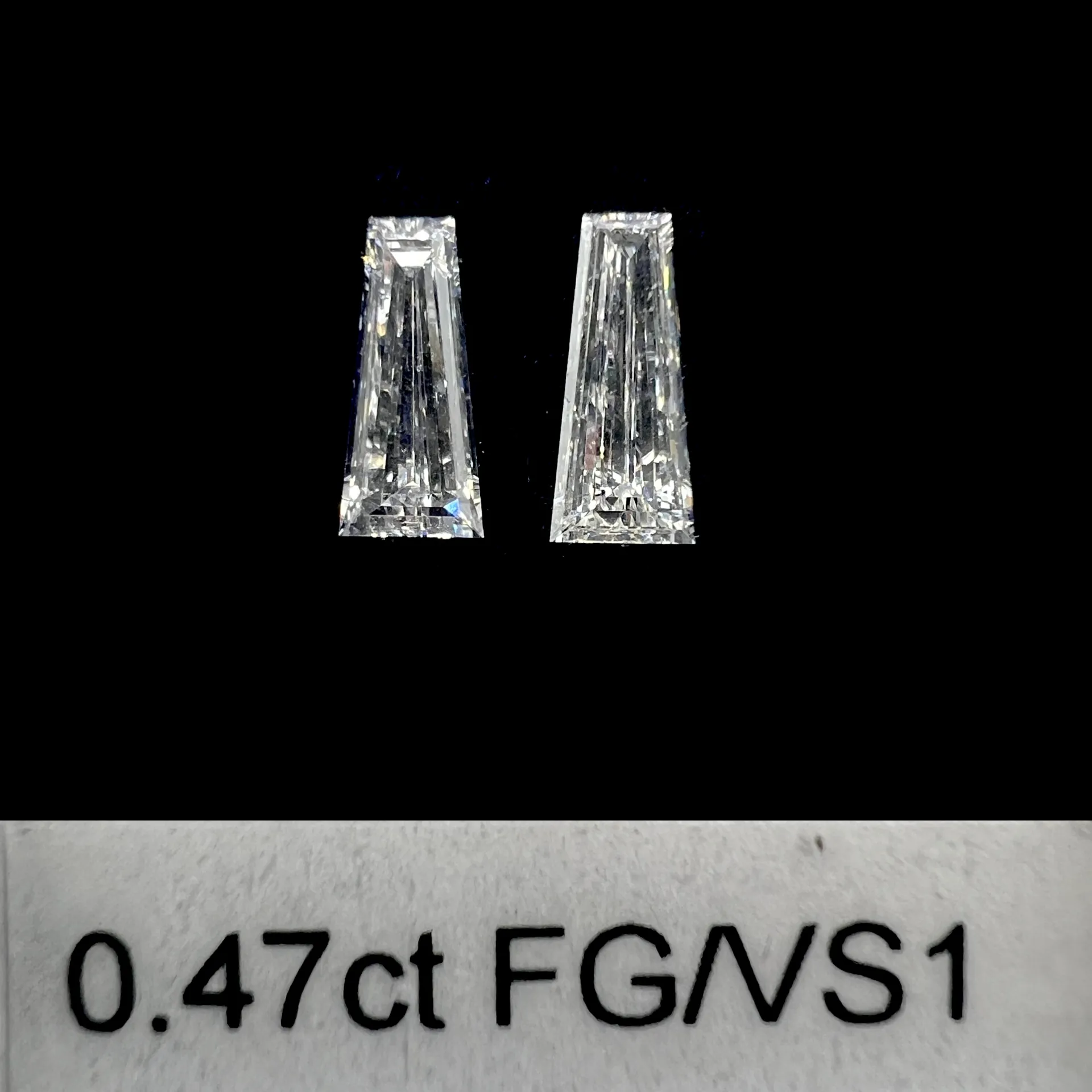 0.47ct matched pair taper baguette