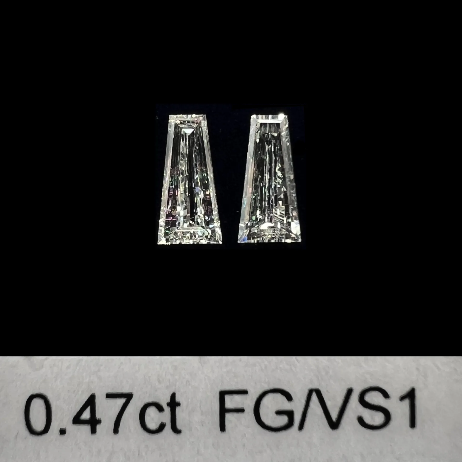 0.47ct matched pair taper baguette