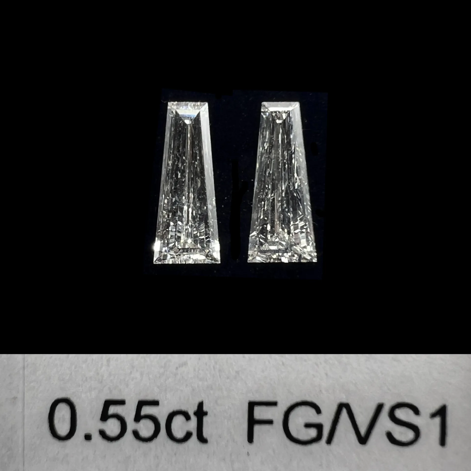0.55ct matched pair taper baguette